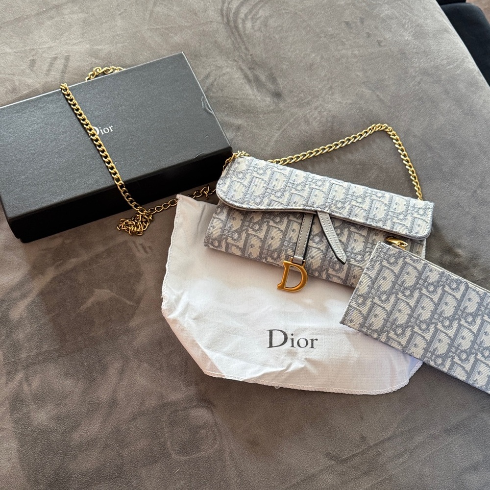 Cute designer inspired wallet on a chain.